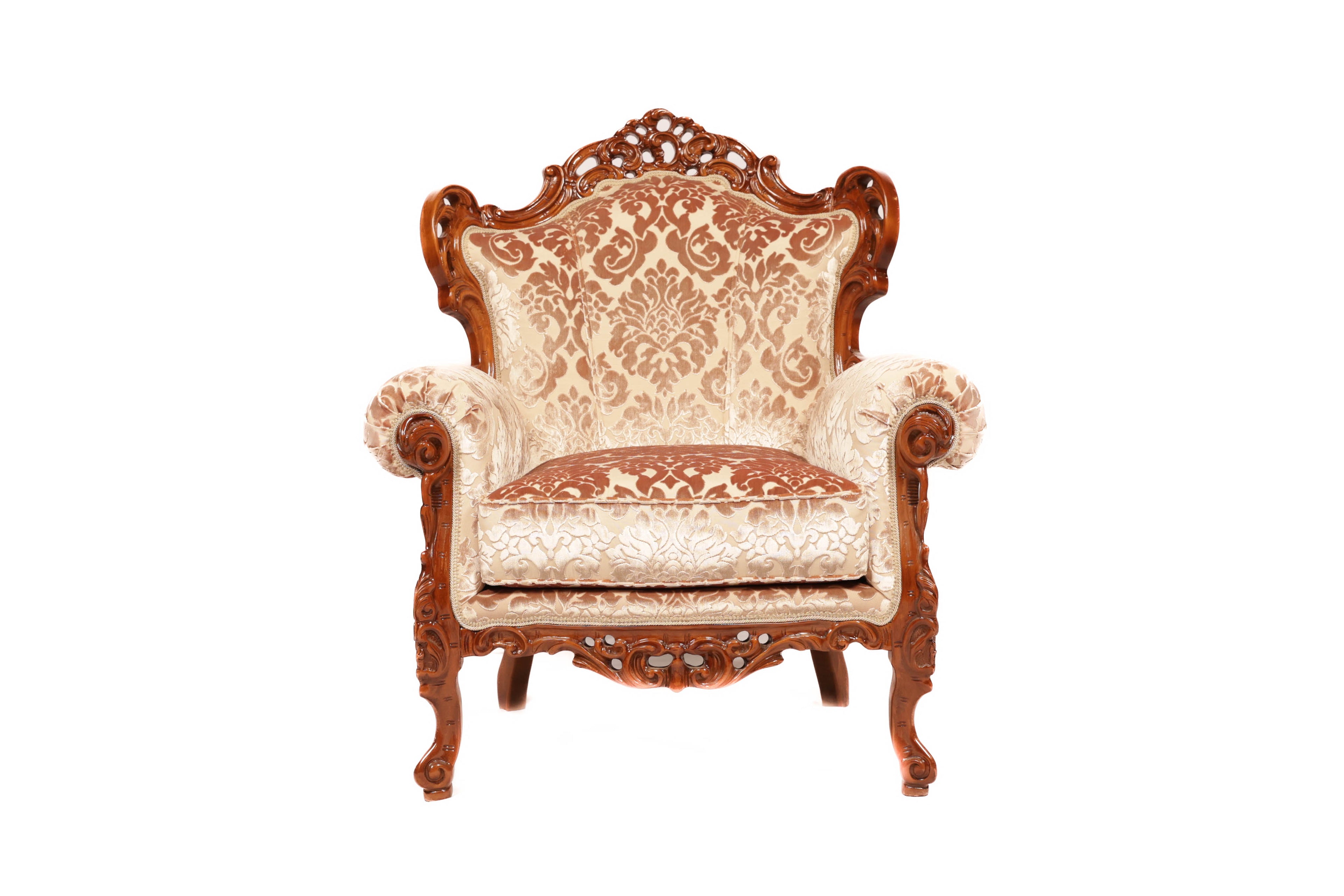 Decorative armchair with intricate woodwork and patterned fabric