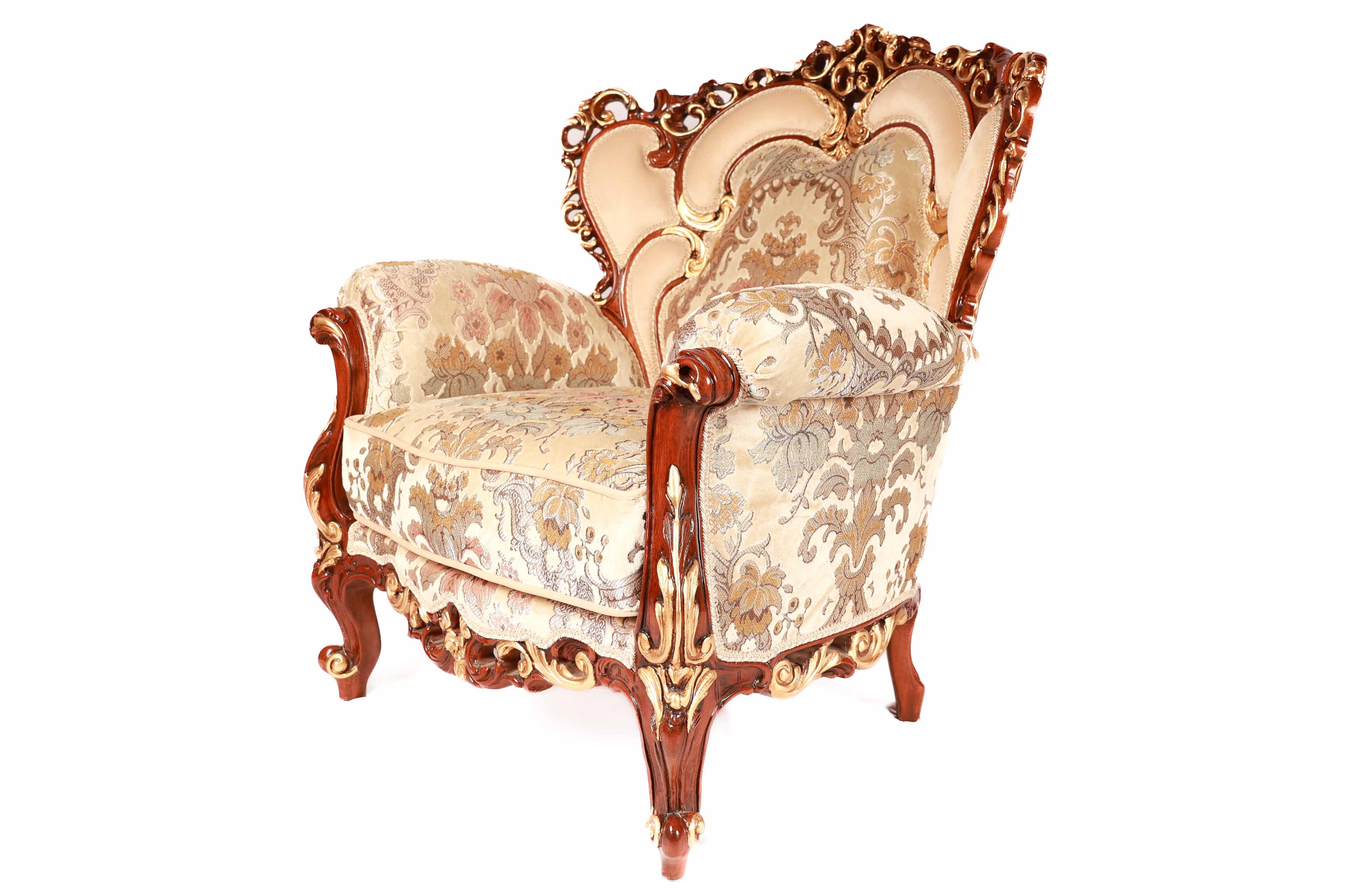 Decorative armchair with intricate carvings and floral patterns