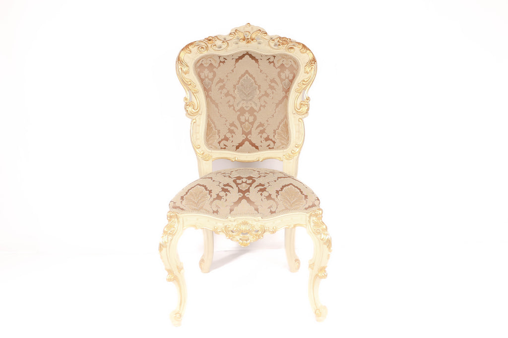 Decorative chair with intricate gold and beige pattern