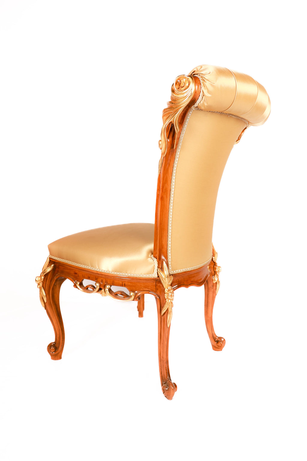 Decorative chair with ornate backrest and wooden frame