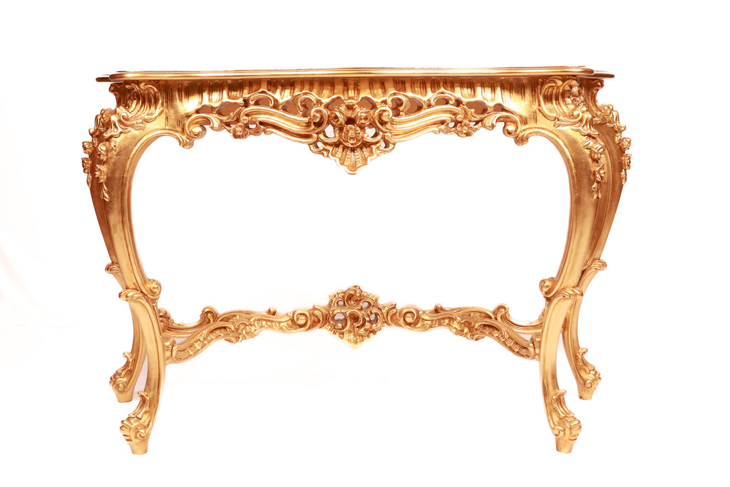 Decorative gold console table with intricate carvings