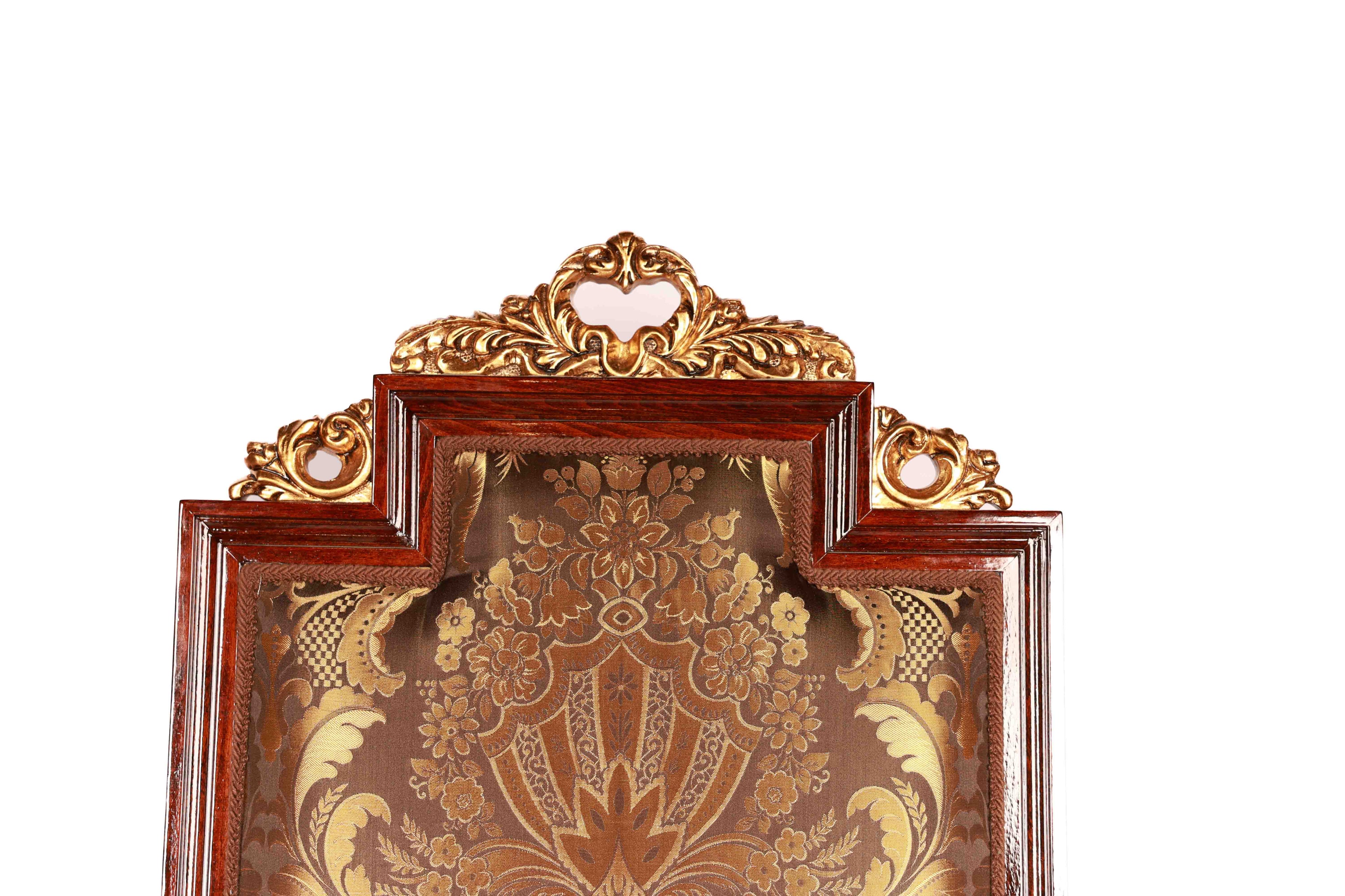 Decorative wooden panel with gold intricate patterns 