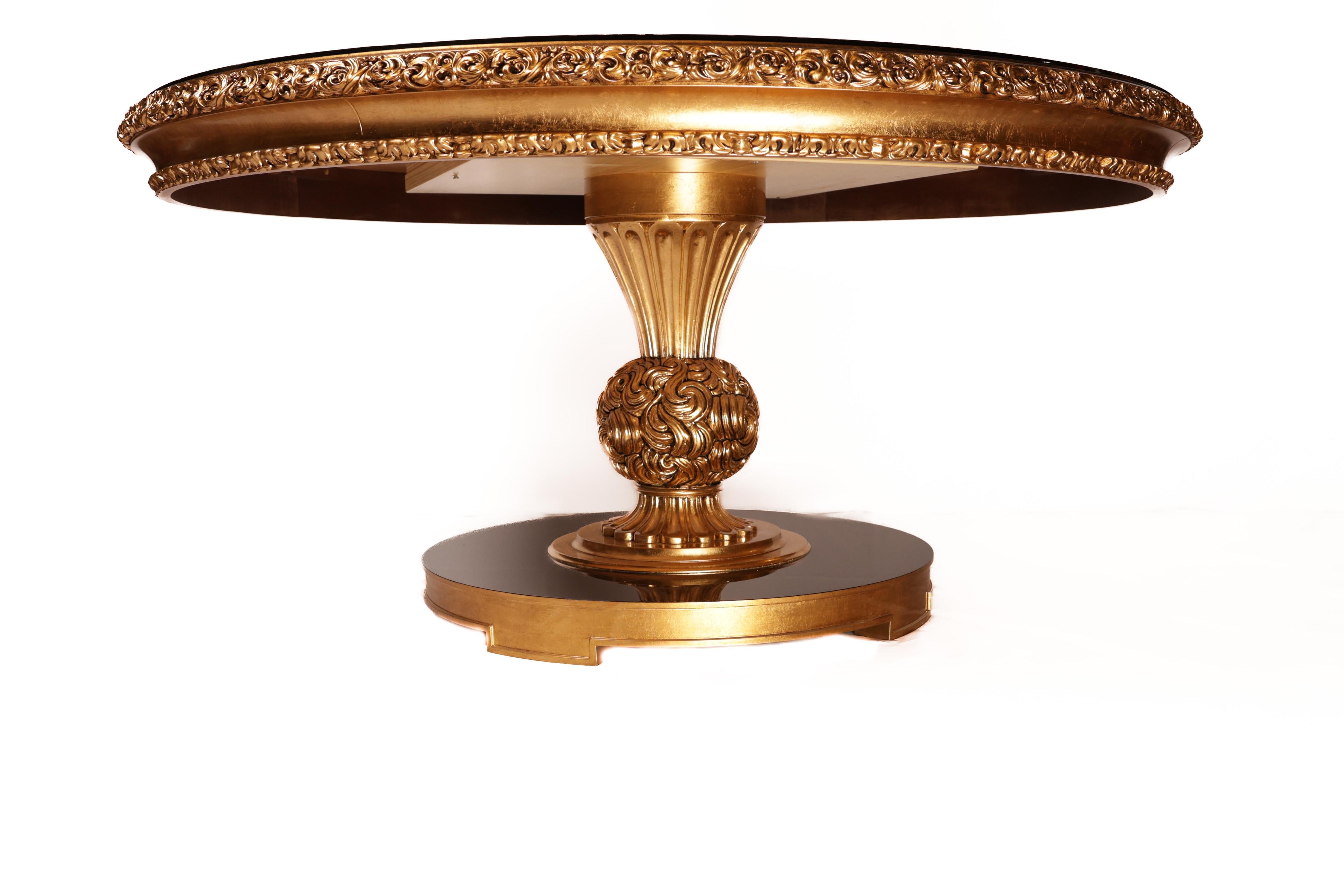Decorative gold table with intricate designs